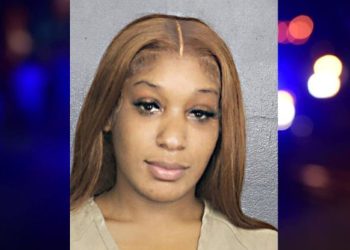 Woman Detained After Pointing Gun During Parking Lot Confrontation