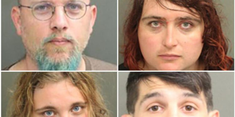 4 People Taken Into Custody After Florida Removes LGBT Political Street Art