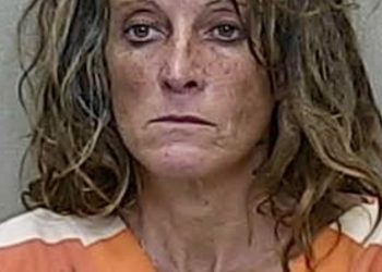 Villager detained after caught panhandling on median