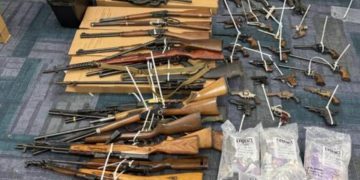 2 people arrested after SWAT seizes 47 firearms and drugs