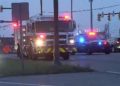 Man apprehended after jumping on top of a semi and fire truck in Cleveland