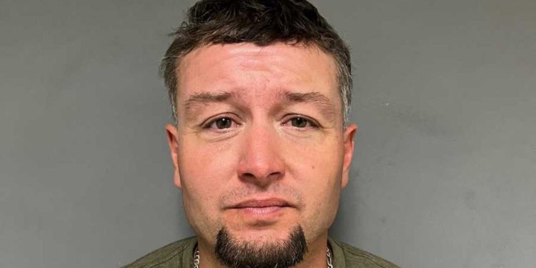 Police apprehend fugitive from New York State